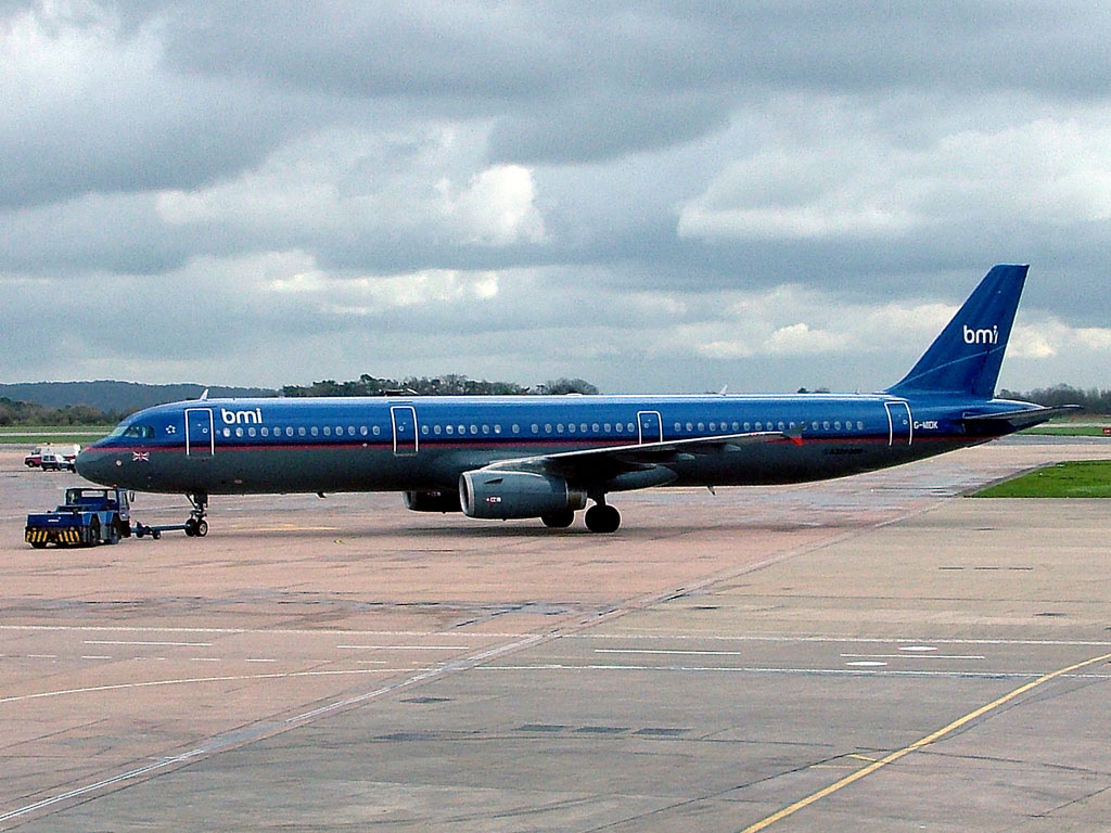 6 April 2004 (1436) bmi British Midland G-MIDK on pushback from Stand 18 at MAN