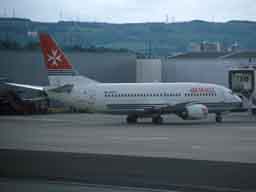 5 June 2003 (1730) 9H-ADH taxiing to stand 27 at GLA