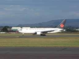 25 September 2003 (0917) C-FBEM rolling out on runway 23 at GLA
