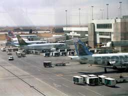Frontier aircraft parked on the south west side of concourse A (2 May 2002)