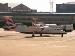 15 July 2003 (1653) G-BRYZ taxiing to stand 1 at MAN
