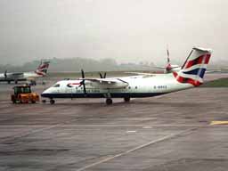 BA Citiexpress Bombardier DH8-202; c/n 464 being towed from stand 41 at MAN
