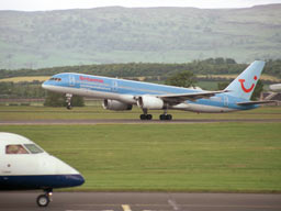 5 June 2003 (1705) G-BYAU taking off on runway 23 at GLA