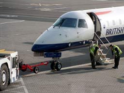 15 May 2003 (0755) G-EMBT BA Citiexpress being attended to by eningeers at GLA Stand 18