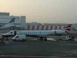 17 February 2003 (0836) BA Citiexpress G-ERJE on stnad 23 at GLA receiving attention from Engineers