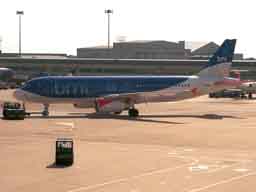 15 July 2003 (1654) G-MIDO on pushback from stand 18 @ MAN