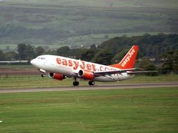 5 June 2003 (1708) G-OMUC taking off on runway 23 at GLA