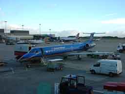 22 September 2003 - bmi British Midland G-RJXA on stand 16 at Manchester after arrival from Glasgow