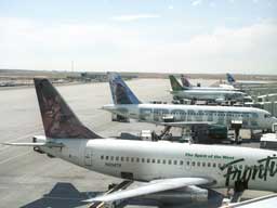 Frontier aircraft parked on the south west side of concourse A (2 May 2002)