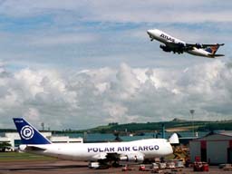 4 August 2001 (1252) N492MC Atlas B744 takeoff on Runway 31 with N920FT Polar B742 on Stand 7